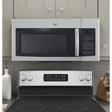 Adding a microwave oven on top of a stove can not only save on valuable counter space but can also act as an exhaust or air vent to eliminate cooking odor from your kitchen. Ge 1 6 Cu Ft Over The Range Microwave In Stainless Steel Jnm3163rjss The Home Depot