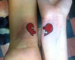 Small puzzle piece heart tattoo on wrist. Pin By Jessica B On Rad Tattoos Puzzle Piece Tattoo Pieces Tattoo Couples Tattoo Designs