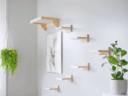 The standing cat scratcher is a wall scratcher designed as a more attractive and stylish replacement for a tall cat scratching post. Klattra Forest Pack Minimal Wall Mounted Cat Steps And Shelf Etsy
