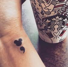 Black silhouette and outline mickey mouse tattoos on shoulder. 41 Cute Disney Tattoos Best Ideas And Designs 2021 Update