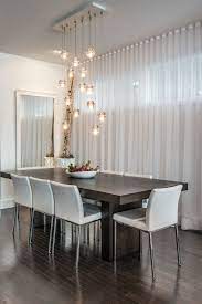 Large glass pendant light for dine lighting and home décor. Calgary Chandeliers Cluster Pendant Lights Dark Wood Table Contemporary Dining Room Dining Room Contemporary Beautiful Dining Rooms