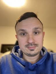 Can anyone please help me give the woman to the left a little bit of beard?  Just a bit