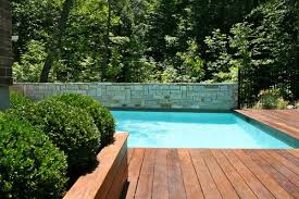 Deck Leading To Swimming Pool In Wooded Lot Wood Pool Deck Pool Decks Outdoor Pool