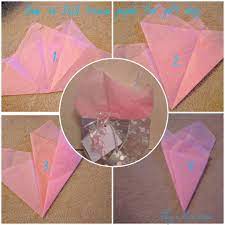 Helpful tips from hallmark on how to put tissue paper in a gift bag to make it look fancy.subscribe: How To Fold Tissue Paper For Gift Bag Gift Tissue Paper Paper Gift Bags Paper Gift Bags Ideas