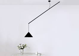 How are pendant lights used in the home? Veronika Gombert S Umleiter Lamp Is Offset From Its Ceiling Rose