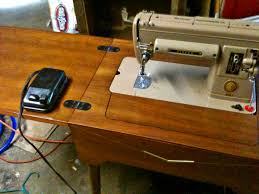 Since the beginning of sewing machines, they have been mounted in a variety of wooden tables and cabinets, or into portable cases. 1951 Singer 301 Sewing Machine With Cabinet Table Collectors Weekly
