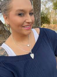 Lady's favorite sweater and Myra earrings