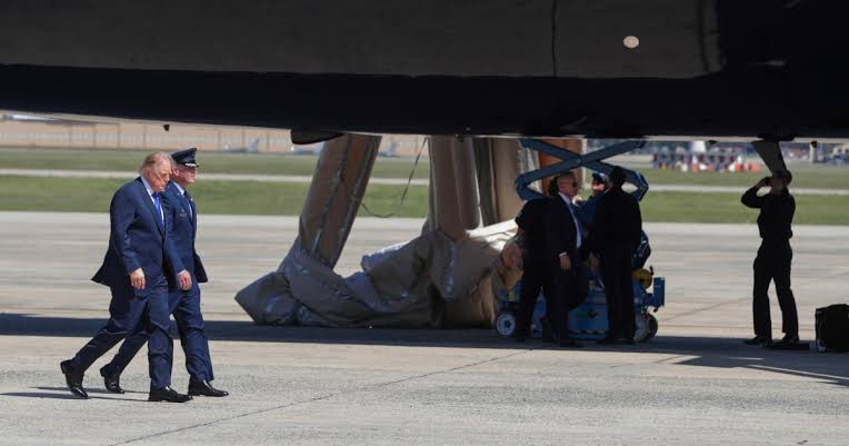 Military personnel accidentally triggered Air Force One emergency slide ahead of Trump's Dallas flight; plane landed safely hours late