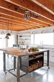 Bring an industrial feel to your modern space with a concrete kitchen island and a metal hood. Kitchen Islands On Casters Industrial Style Kitchen Metal Kitchen Island Kitchen Island On Casters
