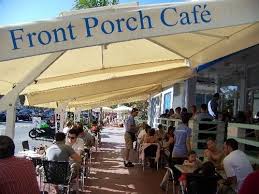 Smoked pork loin, american cheese, texas toast, tomato, pickle spear; Join The Happy Hour At The Front Porch Cafe In Miami Fl 33139