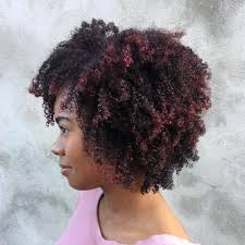 Razor cut, layered dark hair with sparse bangs on front gives an uber cool and stylish look to the girl. 30 Best Natural Hairstyles For African American Women