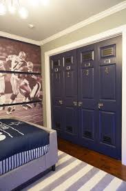 Football Theme Sports Room Closet Doors Transformed As Faux Lockers Boys Room Decor Football Rooms Football Bedroom