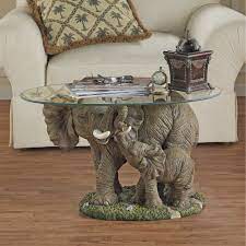 It gives the table a unique style! Design Toscano Figurine Coffee Table Reviews Wayfair