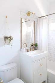 Small white bathroom tiles can be different. Small White Bathroom Features An Ikea Yddingen Washstand Donning Lewis Dolin Round Bar Pulls I Small White Bathrooms House Bathroom Designs Tiny House Bathroom