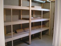 A basement is usually more accessible than an attic, and tends to house sturdy shelving is a must for bin and box storage. Diy Wood Shelves For Basement Woodworking Plans For Table Lamps