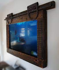 Just select your frame style & art or tv mirror design selections. 9 Awesome Diy Frames For Your Flatscreen Tv Architecture Design Tv Frame Hanging Tv Framed Tv