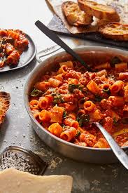 Inspired by @debperelman of @smittenkitchen , this dish was the og that got me hooked on learning to cook. Creamy Tomato Mascarpone Pasta With Spinach And Italian Sausage Delallo