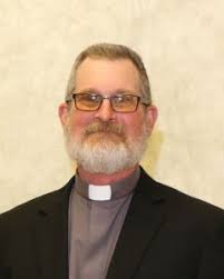 Staff Member: Deacon Jim Law