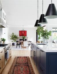 Dark cabinets don't have to be black—if the midnight mood isn't for you, consider a lighter shade of brown. 60 Kitchens That Make A Case For Color House Home