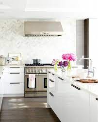 The Most Stylish Ikea Kitchens We Ve Seen White Modern Kitchen White Ikea Kitchen Contemporary Kitchen