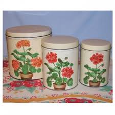 vintage metal canister set three