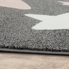 Kleine, schmale teppiche, wie läufer hingegen sind ideal für den flur, den eingangsbereich oder als bettvorleger im schlafzimmer. Teppich Kinderzimmer Kinderteppich Grosse Und Kleine Sterne In Grau Rosa Kaufen Bei Diva Teppich Center