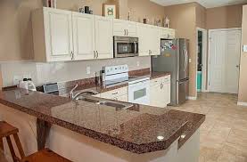 Tan Brown Granite Countertops Pictures Cost Pros And Cons Brown Granite Countertops Brown Granite Tan Brown Granite