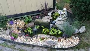Check out results for solid pond liner Easy To Do Corner Garden Pond Preformed Liners And Some Big Decorative Stones Fountains Backyard Pond Landscaping Backyard Water Feature