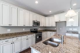 And white kitchen cabinets make it extra difficult to hide the damages. York Antique White Cabinets Charlotte