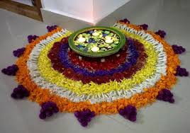 Top 10 Eye Catching Flower Rangoli Designs For Diwali You can make them using diyas, rice, wheat flour, flowers, salt and any shining materials.