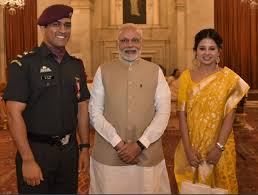 Is the woman in this image narendra modi's wife? Ms Dhoni Grateful To Pm Narendra Modi For Emotional Letter Post Retirement Thank You For The Appreciation