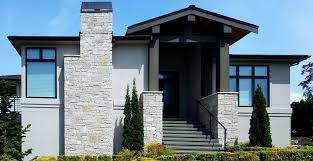 Call today for a free estimate! Modern Outdoor Fireplace Stone Veneer Exterior Stone Home Facade Buechel Stone