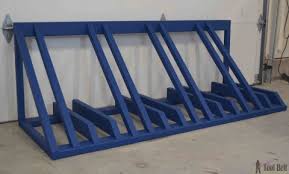 Due to the shape and form of a wooden pallet, it's the perfect raw material to make a straightforward and cheap bike rack. Diy Bike And Scooter Rack Her Tool Belt