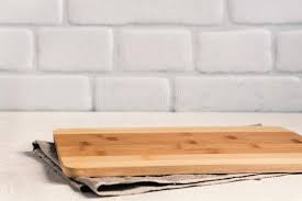 In this episode of the house of hacks, harley takes you on the journey from idea to finished product to show how to make a sewing room cutting table. Background Kitchen With Cutting Board On White Wooden Table With Linen Tablecloth Against The Background A Brick Wall Stock Image Image Of Napkin Board 145556619