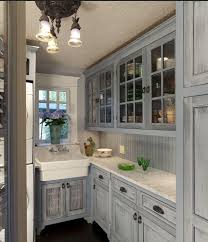 Love The Gray Not The Sink Or The Light Just The Gray Distressed Cabinets Distressed Cabinets Distressed Kitchen Cabinets Milk Paint Kitchen Cabinets