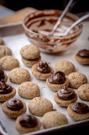 Directions for italian christmas cookie recipe. Italian Cookies Baci Di Dama Natashaskitchen Com
