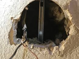 Cotter pin 4 install mounting bracket to outlet box in ceiling using the screws provided with the outlet box and washers. What Sort Of Ceiling Fan Support Do I Need Where I Can T Find Framing Home Improvement Stack Exchange