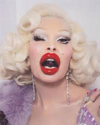 Let Them Eat Grapes❗🍇💜💋 #repost via @tannerabelofficial Amanda Bites the  Grape Sharing the second of three very special series we shot in the studio  with Amanda Lepore. Upon seeing the lavender, diamond