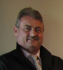 Dennis Holland Obituary