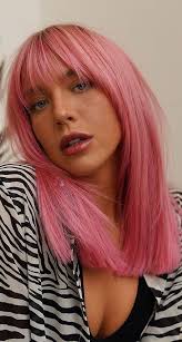 Light and dark purple blend together on a brunette bob with wavy body. Cute Haircuts And Hairstyles With Bangs Pink Hair Color With Bangs