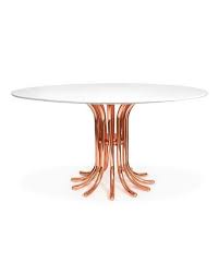 At its base, the faux white marble dining table has a durable stainless steel tulip shaped base, completed in a glamorous gold finish. Rose Gold Base Marble Top Dining Table
