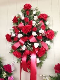 Red and white filler flowers. Silk Funeral Spray Using Red Roses Red And White Rosebuds And White Filler With Red Ribbons Octobe Funeral Floral Funeral Floral Arrangements Funeral Sprays