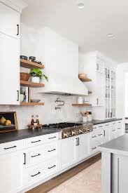 Maxispace gives you more work and wash space, and with drawers, cabinets and shelves to organize your space. White And Gray Tiles With Kohler Artifacts Double Jointed Swinging Pot Filler Transitional Kitchen