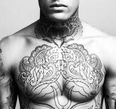 Intricate shapes combined with swirling text keep on theme with the overall design. Cool Chest Tattoo Designs Men Arm Tattoo Sites