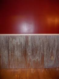 The black metal fabrication is sleek and grounds the white and light finishes found elsewhere in the open living space. 20 Chair Rail Ideas Chair Rail Tin Walls House Design