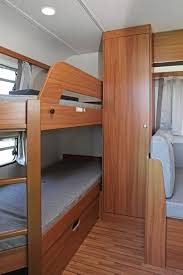 The king bed lifts up to reveal additional storage underneath. 9 Great Travel Trailers With 2 Bedrooms Camper Report
