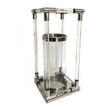 This is a simple glass hurricane candle holders, banded with metal. Candle Holders Furniture Traders Of Thirsk