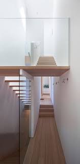 Vancouver House By Canadian Studio Splyce Design Features A Lopsided Roof That Follows The L Interior Architecture Interior Architecture Design Interior Stairs