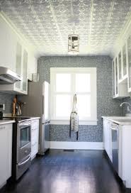 This Whole House S Remodel Is Amazing And Inspiring Tin Ceiling Kitchen Kitchen Ceiling Tile White Tin Ceiling