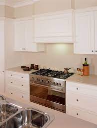 Symmetrical And No Silver Range Hood Traditional Kitchen Design Kitchen Showcase Kitchen